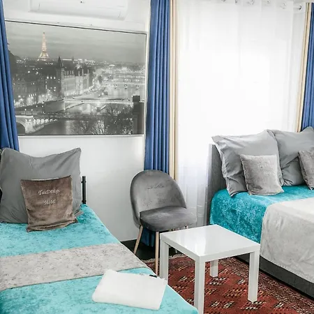 Tau Design * إرلانجن